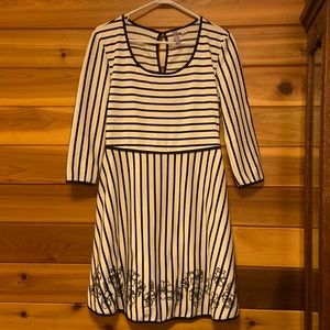 Black and white striped dress with floral stitching